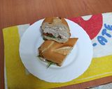 Foto del paso 4 de la receta Bocadillo de merluza frita con lechuga, tomate y mayonesa