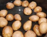 A picture of step 1 of Nepali style Aloo Dum with Chiwda /Poha/ Flattened rice.
