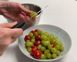 A picture of step 2 of Marinated Tomatoes & Green Grapes.