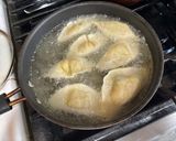 A picture of step 7 of Pan Fried Chicken Potstickers.