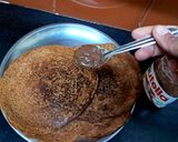 A picture of step 4 of Banana pancake with nutella.