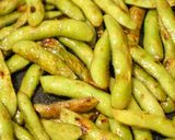 A picture of step 6 of Irresistible Spicy Grilled Edamame.