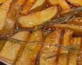 A picture of step 5 of Fried potatoes - garlic, rosemary, thyme.