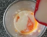 A picture of step 2 of Papaya strawberry thick shake.