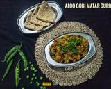 A picture of step 13 of Aloo Gobhi Matar Curry.