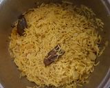 A picture of step 8 of Onion turmeric pulao wrapped in egg.