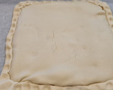 Foto del paso 4 de la receta: Torta de hojaldre con crema pastelera de chocolate y almendras