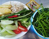 Hình bước làm 2 của món Canh chua nấu thịt gà