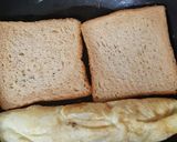 A picture of step 3 of European omelet with brown bread.