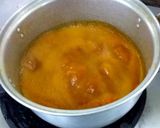 A picture of step 4 of Southern Thai Sour Curry with Salmon Head and Pickled Bamboo Shoots.