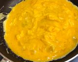 A picture of step 5 of Japanese Egg Wrapped Tomato Chicken Rice (Omu Rice).
