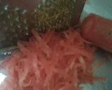 A picture of step 1 of Gajar Ka halwa.