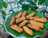 A picture of step 4 of Ethakka Appam (Banana Fritters).