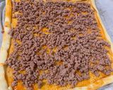 Foto del paso 5 de la receta: Receta de pizza con masa de hojaldre