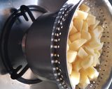 A picture of step 2 of Aloo palak with makhani gravy.