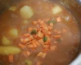 A picture of step 5 of Matoke (Vegetables incorporated).