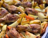 Une image de l'étape 3 de Pilons de poulet et pommes de terre au four.