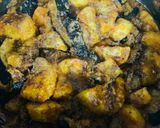 A picture of step 7 of Aloo Baingan.