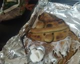 A picture of step 6 of Santa chapati pizza.