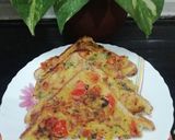 A picture of step 9 of Rava & Mix Veg Toast.