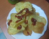 Foto del paso 3 de la receta: Papas onduladas fritas al ajillo con ketchup