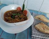 A picture of step 7 of چنا دال گوشت.