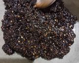 A picture of step 3 of Black sesame ladoo.