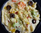 A picture of step 8 of Cheesy and Creamy veggie white sauce penne pasta (with fresh cream, cheese and seasonings).