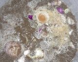 A picture of step 4 of Red Oil Cassava leaf.