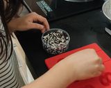 A picture of step 7 of Chocolate sprinkles numbers.