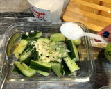 A picture of step 6 of Let's bond over cucumber salad and egg congee.