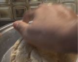 A picture of step 13 of Dal Bafla Baati Churma.