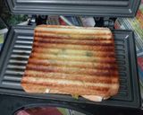 A picture of step 6 of Veg cheese sandwich.