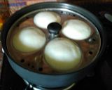 A picture of step 7 of Potato Stuffed Idli.