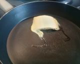 A picture of step 2 of Bacon and egg deluxe sandwich.