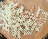 A picture of step 13 of Chicken kebab makhani pasta.