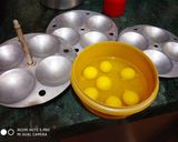 A picture of step 1 of Steamed Egg Curry.