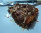 Foto del paso 4 de la receta: Pastel de tortilla de frijoles con chiles dorado, epazote y queso las Correa