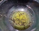 A picture of step 2 of Rosemary herbal tea.