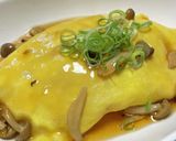 A picture of step 9 of *Savory Mushroom Japanese-Style Omurice with Dashi Gravy.