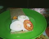 A picture of step 2 of Air Fryer Egg Bread Pizza.