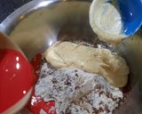 A picture of step 4 of 2 tier Red velvet cake.