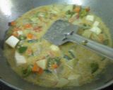 A picture of step 6 of Rosgolla naboratan korma.