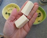 Foto del passaggio 8 della ricetta Tortino di zucchine con cuore di provola