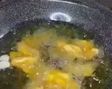 A picture of step 2 of Crispy garlic potato wedges.
