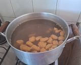 A picture of step 14 of Zucchini and Sweet Potato Gnocchi with Meat Sauce.