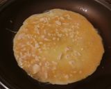 Foto del paso 4 de la receta Tortilla francesa a la mantequilla y queso en porciones