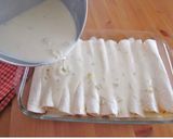 A picture of step 8 of Creamy White Chicken Enchiladas.