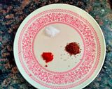 A picture of step 2 of Tomato Raita seasoned with Mustard seeds.