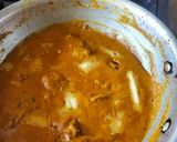 A picture of step 8 of Butter chicken served with buttered Naan bread.